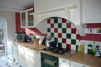Kitchen leading to secluded garden